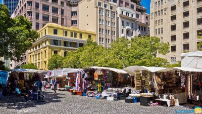 Stalls with surrounding architecture on Greenmarket Square in Cape Town