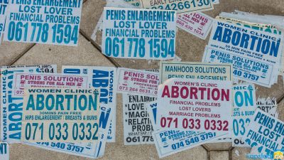 All kinds of sticker advertising in the Cape Town railway station area